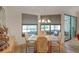 Inviting dining room with ample natural light and access to outdoor living space at 934 Lucas Ln, Oldsmar, FL 34677