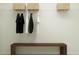 Walk-in closet with rod, shelf, and seating featuring excellent storage solutions at 10270 Purple Leaf Ct, Riverview, FL 33578