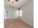 Bedroom featuring carpet, a ceiling fan, and a window at 12352 Crestridge Loop, New Port Richey, FL 34655