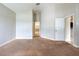 Spacious bedroom featuring carpet and a neutral color palette at 12352 Crestridge Loop, New Port Richey, FL 34655