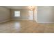 Spacious living room with tile flooring, offering a versatile layout and lots of natural light at 12352 Crestridge Loop, New Port Richey, FL 34655