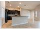 Living Room featuring kitchen with granite countertops and stainless appliances at 12352 Crestridge Loop, New Port Richey, FL 34655