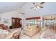 Inviting living room with vaulted ceilings, ceiling fans, and comfortable seating arrangements at 124 Barrington Dr, Brandon, FL 33511