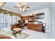 Home office with built-in desk, TV, ample storage and large window at 124 Barrington Dr, Brandon, FL 33511