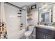 Bathroom featuring a shower-tub combination and modern vanity at 1594 Cassius St, Lutz, FL 33549
