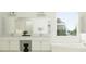 Bright bathroom features double sinks, white cabinetry, and a soaking tub by a large window at 16983 Falling Waters Ct, Land O Lakes, FL 34638