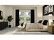 Bright bedroom with large windows, a comfortable bed, and sleek furnishings at 16983 Falling Waters Ct, Land O Lakes, FL 34638