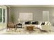 Comfortable living room featuring a neutral palette and natural light at 16983 Falling Waters Ct, Land O Lakes, FL 34638