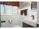 Bathroom featuring a modern sink, bronze fixtures, and white beadboard paneling at 1722 48Th N Ave, St Petersburg, FL 33714
