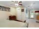 Bedroom with a ceiling fan, artwork, and access to the rear yard at 1722 48Th N Ave, St Petersburg, FL 33714