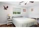 Bedroom featuring a queen sized bed, wood floors, and light blue walls at 1722 48Th N Ave, St Petersburg, FL 33714