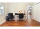 Office with two work stations, hardwood floors, and recessed lighting at 1722 48Th N Ave, St Petersburg, FL 33714