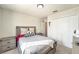 Inviting bedroom featuring a dresser, double door closet and soft lighting, creating a peaceful and relaxing space at 2140 Laceflower Dr, Brandon, FL 33510