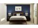 Inviting bedroom featuring a racecar theme and plenty of natural light at 2278 Blue Grosbeak Pl, Wimauma, FL 33598