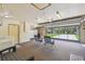Garage with overhead door, carpeting, utility cabinets, sink, and laundry appliances at 2436 Covington Ave, Spring Hill, FL 34608