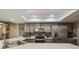 Charming kitchen featuring stainless steel appliances, stone backsplash, and plenty of counter space at 2436 Covington Ave, Spring Hill, FL 34608