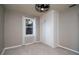 Neutral bedroom features gray walls, light floors, large window, ceiling fan and closet at 2616 47Th N Ave, St Petersburg, FL 33714
