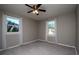 Sunlit bedroom with two windows and neutral walls, offering a bright and peaceful retreat at 2616 47Th N Ave, St Petersburg, FL 33714