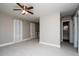 Spacious living area featuring grey walls, modern tile flooring, and ample natural light at 2616 47Th N Ave, St Petersburg, FL 33714
