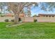 Fenced in backyard with grass and tree at 2696 60Th Avenue W Ter # 10, Bradenton, FL 34207