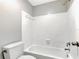 Bright bathroom features a clean, tiled shower-over-tub and modern fixtures at 2696 60Th Avenue W Ter # 10, Bradenton, FL 34207