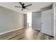 Clean bedroom features wood-look floors, fresh paint, and modern fan at 2696 60Th Avenue W Ter # 10, Bradenton, FL 34207