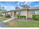 Lovely single story home featuring well-manicured landscaping and a welcoming entrance at 2696 60Th Avenue W Ter # 10, Bradenton, FL 34207