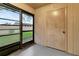 Enclosed lanai with sliding windows and a view to the exterior yard at 2696 60Th Avenue W Ter # 10, Bradenton, FL 34207