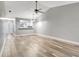 Expansive living room showcasing vaulted ceilings, stylish floors, and open access to the kitchen at 2696 60Th Avenue W Ter # 10, Bradenton, FL 34207