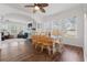 Bright dining room with a wooden table set and an abundance of natural light at 2700 10Th W St, Palmetto, FL 34221