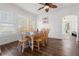 Bright dining area with wood table, hardwood floors and lots of natural light at 2700 10Th W St, Palmetto, FL 34221