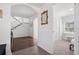 Inviting foyer showcasing staircase, hardwood floors, and elegant archways at 2700 10Th W St, Palmetto, FL 34221