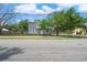 A charming two-story home boasts a classic design, enhanced by mature trees and a meticulously kept yard at 2700 10Th W St, Palmetto, FL 34221