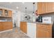 Functional kitchen with essential appliances, tile flooring, and ample counter space at 2700 10Th W St, Palmetto, FL 34221