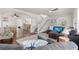 Open-concept layout showcasing the living room, dining area, and kitchen with a breakfast bar at 2700 10Th W St, Palmetto, FL 34221