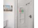 Close up of the shower stall features modern shower head and soap caddy at 2700 10Th W St, Palmetto, FL 34221