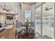 Bright breakfast nook with sliding glass doors leading to the screened pool at 2712 Clubhouse Dr, Plant City, FL 33566