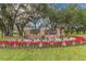 Community entrance sign amid lush landscaping and mature trees evoking the charm of All Florida at Walden Lake at 2712 Clubhouse Dr, Plant City, FL 33566