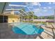 Inviting pool and spa surrounded by a screened enclosure, offering a private outdoor retreat at 2712 Clubhouse Dr, Plant City, FL 33566