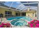 Gorgeous pool and spa with an enclosed screened area, perfect for entertaining at 2712 Clubhouse Dr, Plant City, FL 33566
