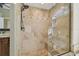 The bathroom features a tiled shower with a built-in bench and a glass enclosure at 2712 Clubhouse Dr, Plant City, FL 33566