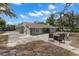 Spacious backyard with seating area, ideal for entertaining or relaxing outdoors at 3119 W North St, Tampa, FL 33614