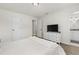 Bedroom features wood floors, fresh paint, and easy access to the Primary bathroom at 3119 W North St, Tampa, FL 33614