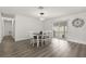 Dining room with wood floors and sliding glass doors that allow for natural light at 3119 W North St, Tampa, FL 33614
