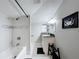 Clean bathroom with a bathtub, vanity with granite countertop, and modern fixtures at 3213 E Genesee St, Tampa, FL 33610
