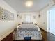 Cozy bedroom with a comfortable bed, natural light, and tasteful decor at 3213 E Genesee St, Tampa, FL 33610
