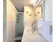 Bathroom featuring a vanity with a sink and a walk-in shower with patterned glass door at 34483 Cactus N Dr, Pinellas Park, FL 33781