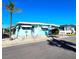 Well-kept mobile home with a convenient carport, adorned with charming details and set in a tidy community at 34483 Cactus N Dr, Pinellas Park, FL 33781