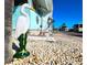 Welcoming front porch with decorative heron statue and well-kept landscaping, enhancing its curb appeal at 34483 Cactus N Dr, Pinellas Park, FL 33781
