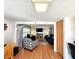 Inviting living room layout with hardwood floors, comfortable furniture, and seamless flow into other living spaces at 34483 Cactus N Dr, Pinellas Park, FL 33781